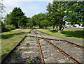 Crossing over disused railway near Leuchars Station