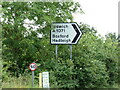 TL9239 : Signpost on the A134 Further Street by Geographer