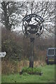 Stone village sign