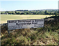 Bilingual signage at the junction of the B180 and Burrenbridge Road