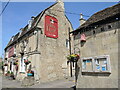 A noticeboard by the pub