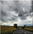 SU0343 : Chitterne Road under stormy skies by Anthony Parkes