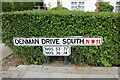 TQ2588 : Newly painted sign in Denman Drive South, Hampstead Garden Suburb by David Howard