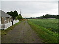 Cottage beside track at Hillhead of Burghill