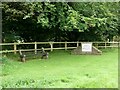 Bench and sign at Carterway Heads