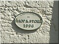 SH5872 : Shop & Store 1996 plaque on the High Street, Bangor by Meirion