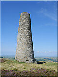 NY8053 : Chimney and cairn on the moor by James T M Towill