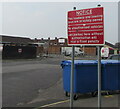 White on red notice near private land, Bridgend