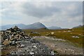 NH1082 : Cairn at the highest point by Jim Barton