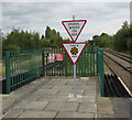 Triangular signs at the northern end of Platform 4, Wrexham General station