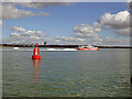 SU4209 : Ferry 'Redjet 6' passes Hythe Knock buoy, Southampton Water by Robin Webster