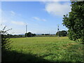 Grass field near Hethelpit Cross