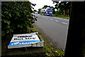 Fallen down bus stop sign, Raw