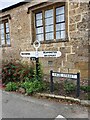 Direction Sign ? Signpost on High Street, Broadwindsor