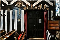 SJ8470 : Siddington, All Saints Church: Corn dollies above a door by Michael Garlick
