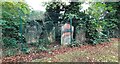 Gravestones from former Holy Trinity Church churchyard stored by boundary wall