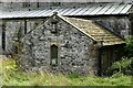 Taddington, St. Michael and All Saints Church: Niched sculpture in the north wall