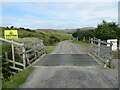 Cattle gridded minor road to Langwell