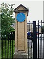 Plaque on the gatepost of Denison Hall