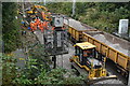 Renewing railway ballast below Avenue Road Bridge