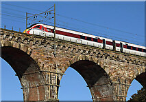 NT9953 : A train on the Royal Border Bridge by Walter Baxter