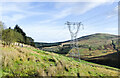 NX3293 : High voltage power lines on hill slope by Trevor Littlewood