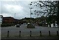 Looking from Waitrose across a roundabout into The Woolsack