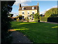 House next to the church, Besford