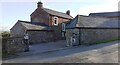 Croft House and farm buildings at High Wreay on SE side of road