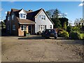 House where footpath should be, Besford