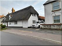 TL3856 : Thatched cottage on West Street, Comberton by David Howard