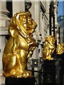 TQ3181 : Gilded gold lions by Philip Halling
