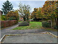 Small green space behind houses on Meadway