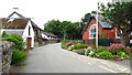 Flower borders & primary school at Carrog