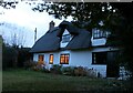 TL3862 : Honey Hill Cottage at dusk, Pettitt's Lane by Martin Tester