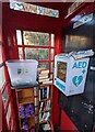 Inside a former red phonebox, Llandegveth