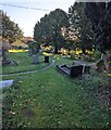 ST3395 : Narrow churchyard path, Llandegveth by Jaggery