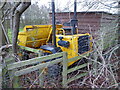 Footpath blocked with a yellow dumper truck at Holloway Villa, Bings Heath