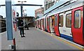 Train arriving at Harrow on the Hill station