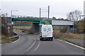 A6003 passes under railway via Corby