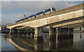 J3474 : Train and bridge, Belfast by Rossographer
