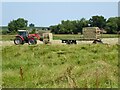 SO9137 : Loading large hay bales in Twyning Meadow by Philip Halling