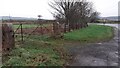 Field gateway on north side on Plumptonfoot road at its junction with A6