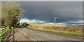 Dark sky and sunshine, B4293 north of Cobblers Plain, near Chepstow