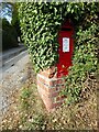 Battered post box on Barn Lane