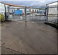 Gates across the entrance to Little Castle Business Park, Raglan