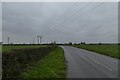 SE6335 : Road in Barlby in the rain by DS Pugh