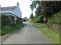 Minor road about to join the B6453 road in Midlem