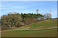 SO7694 : Wooded hillside with mobile phone masts by Roger  Kidd