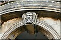 Thetford: Carving above the entrance to The Guildhall